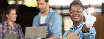 Employee talking to customers