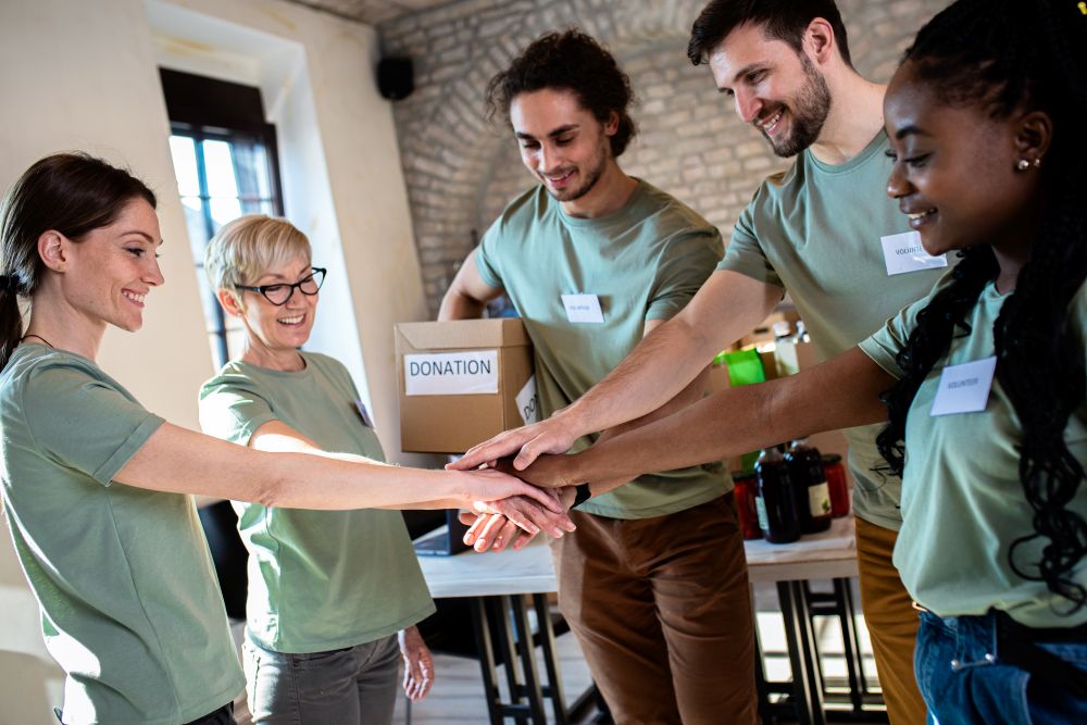 People learning and collaborating in a bright community space (placeholder image).